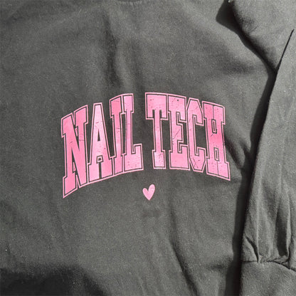 Gray sweatshirt with 'NAIL TECH' in pink text and a heart symbol.